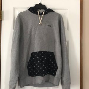 Vans small sweatshirt small stain above Vans logo